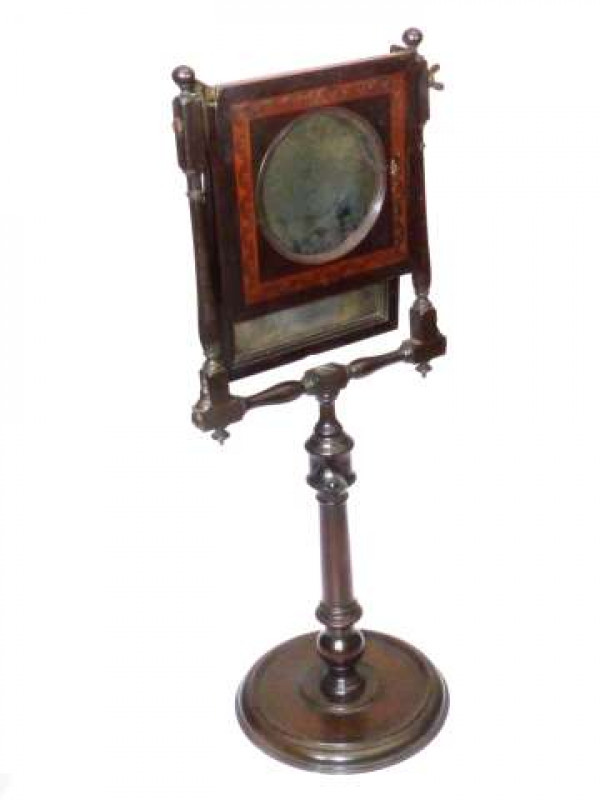 A 19TH CENTURY INLAID MAHOGANY ZOGRASCOPE With turned adjustable stem and dished base. 66cm