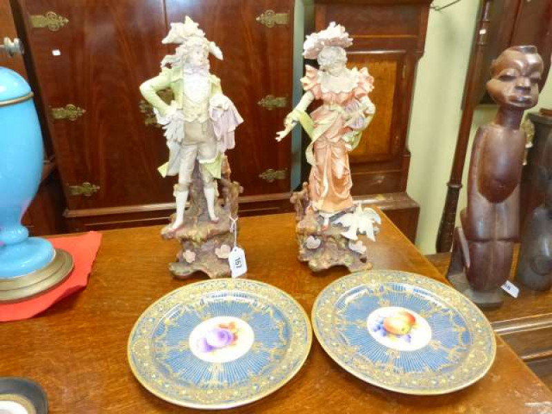 Pair Royal Worcester fruit painted and gilt plates, and pair of bisque figures
