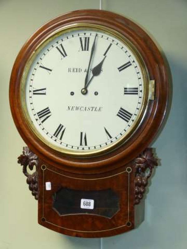 A mahogany wall clock, signed Reid & Sons, Newcastle, 12 inch dial with Roman numerals, single fusee movement with shaped plates, anchor escapement
