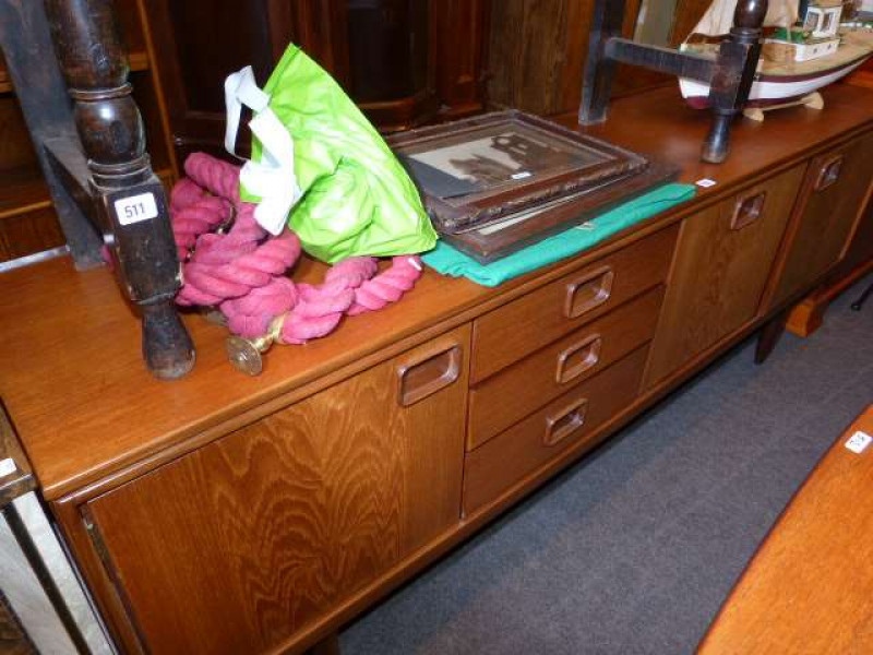 Teak six piece dining suite and two door bookcase