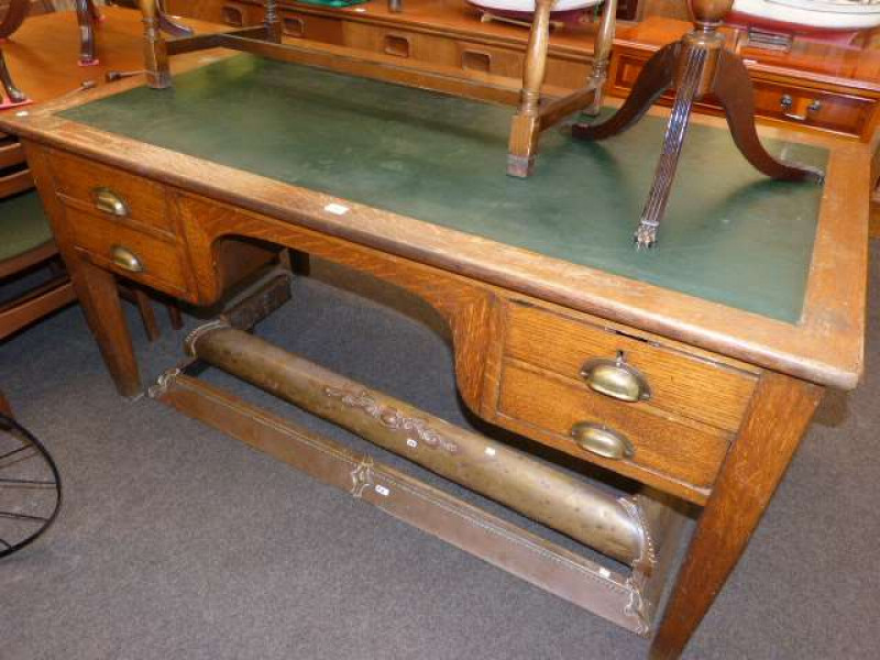 Oak four drawer writing table