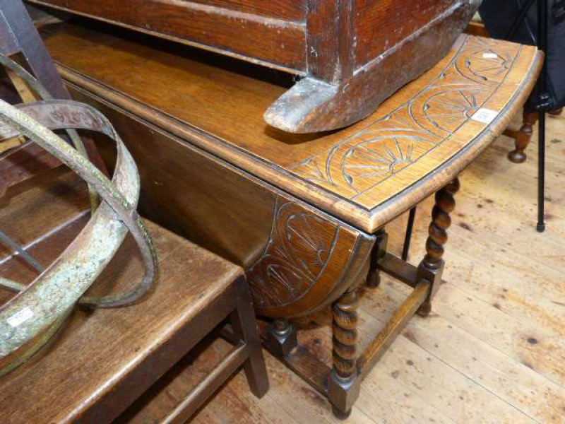 Oak barley twist gate leg dining table with carved border