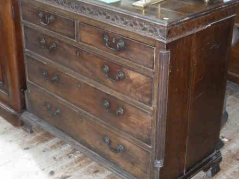 Georgian Mahogany Chest of two short above three long drawers on ogee...