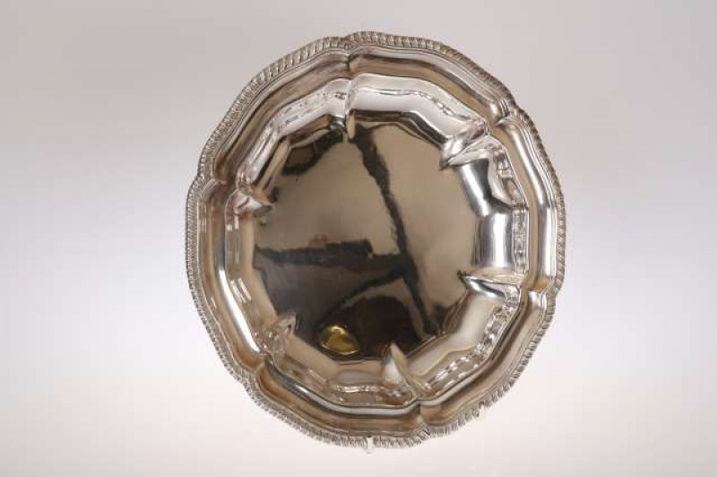 A GEORGE IV SILVER VEGETABLE DISH, Robert Garrard II, London 1826, of shaped circular form with gadrooned rim, engraved with a crest. 28.5oz, 28cm