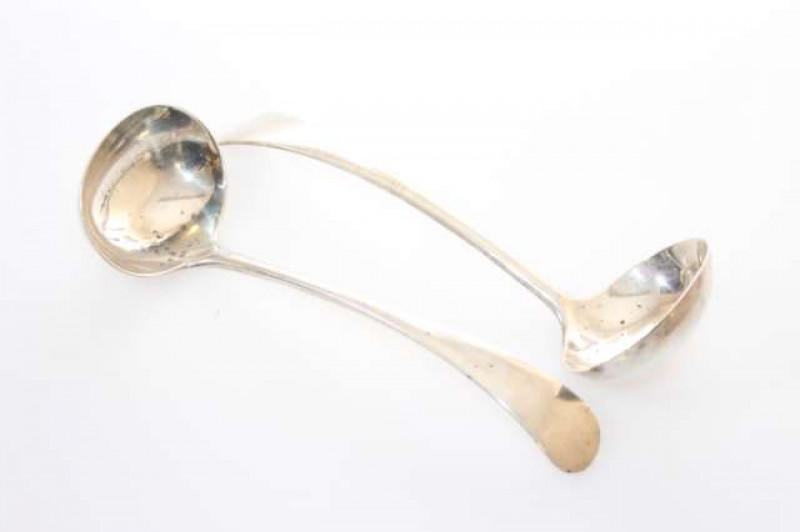 A PAIR OF SILVER SAUCE LADLES, William Hutton & Sons Ltd, London 1913, Old English pattern; together with A PAIR OF GEORGE III SILVER TABLESPOONS, Peter & William Bateman, London 1808, Old English pattern with later embossed berry bowls; and A PAIR OF APO