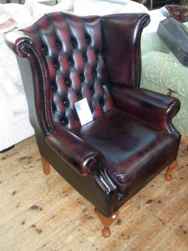 Burgundy Buttoned Leather and Studded Wing Easy Chair on cabriole legs