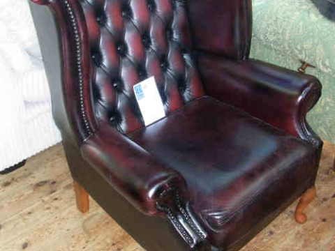Burgundy Buttoned Leather and Studded Wing Easy Chair on cabriole legs