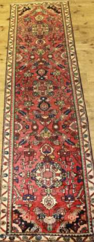 A MALAYER RUNNER. 285cm by 78cm