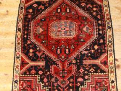 A TOYSERKAN RUG. 191cm by 88cm