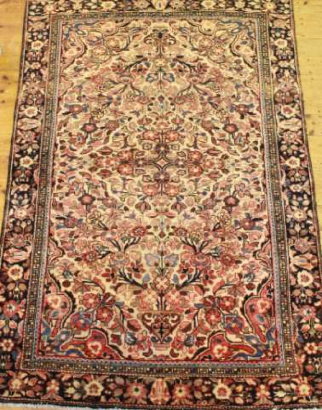 A SAROG RUG. 200cm by 135cm