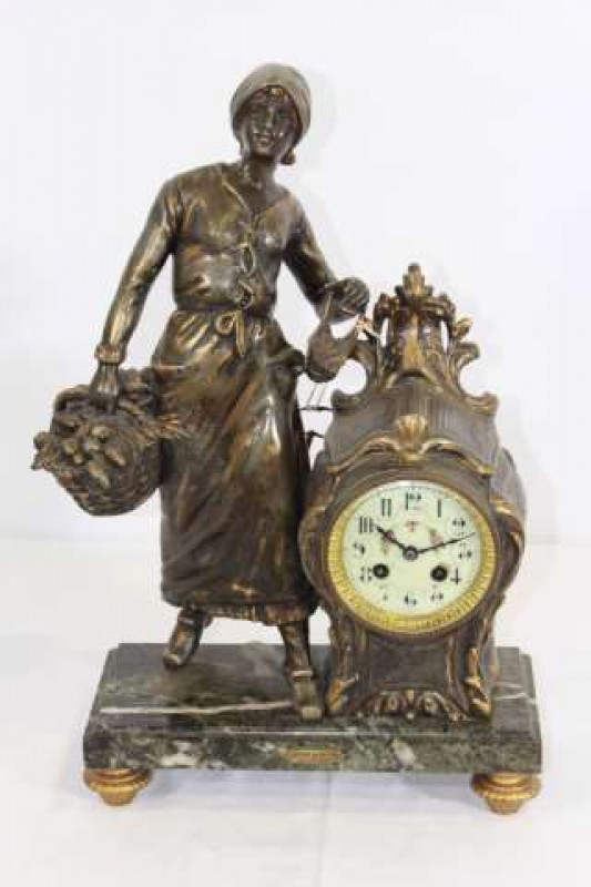 A FRENCH 19TH CENTURY SPELTER AND MARBLE MANTEL CLOCK, the two-train drum movement with outside countwheel striking the hours and half hours on a bell, the figure of a girl holding two baskets, after Moreau, titled 'Retour du Marche', on a veined marble p