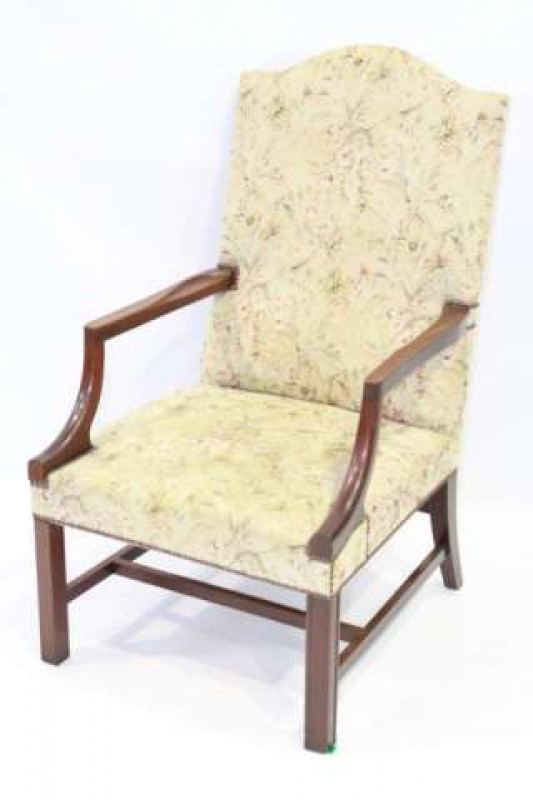 A 19TH CENTURY MAHOGANY ARMCHAIR OF GAINSBOROUGH TYPE, with upholstered rectangular back with arched top, the stuffed over seat raised on moulded square-section legs.