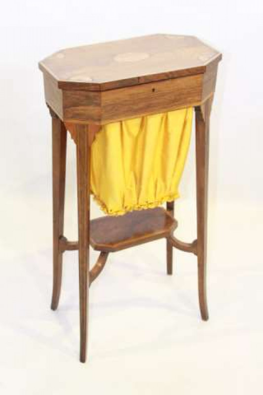 A LATE 19TH CENTURY INLAID ROSEWOOD WORK TABLE, the rectangular top with canted corners over a basket, raised on square-section tapering legs, joined by a shelf stretcher. 78cm by 40cm by 23.5cm