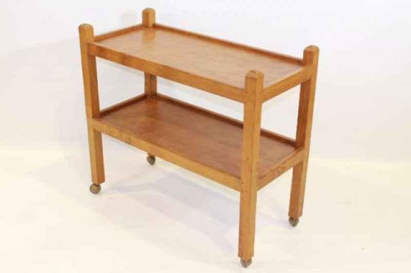 AN ALBERT 'EAGLEMAN' JEFFERIES OAK DINNER WAGON, with two tiers, adzed throughout, moving on castors, 78cm by 86cm by 39cm; together with A SET OF THREE ALBERT 'EAGLEMAN' JEFFERIES OAK NESTING TABLES, comprising a rectangular table and a pair of square ta