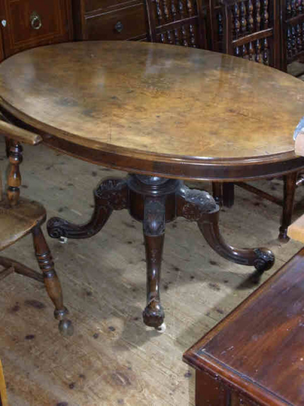 Victorian Oval Walnut and Satinwood Inlaid Breakfast table on Turned Pedestal to Scroll Legs