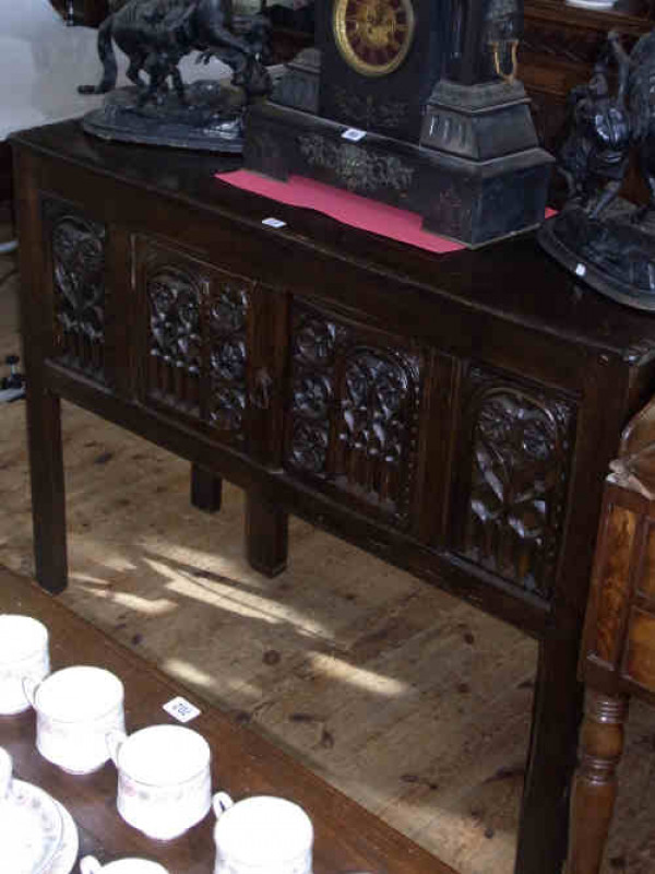 Carved Oak Four Panel Front Mule Chest