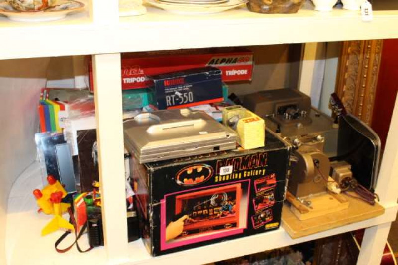Guitar, various toys, Kodascope Eight-500 projector, etc
