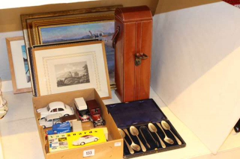 Model vehicles, silver spoons and tongs, leather bottle holder and pictures
