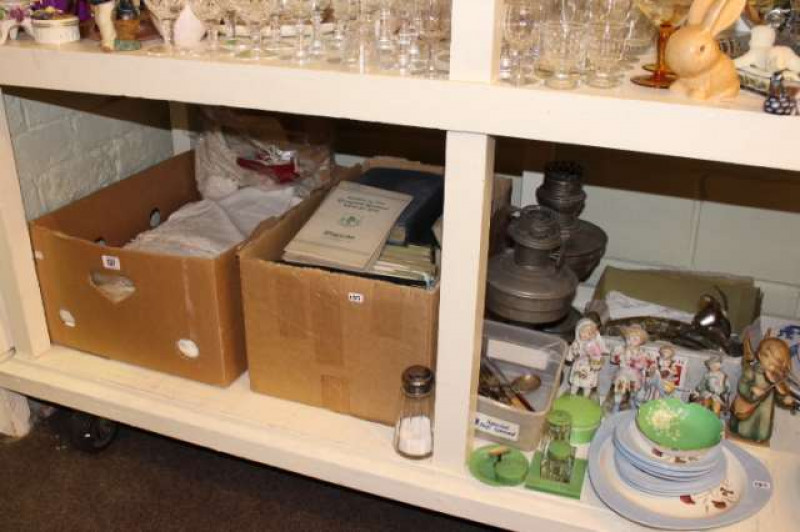 Box of lace and linen, books, lustre light fitting, figures, oil lamps, etc