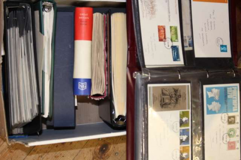 Box with first day covers and stamps in albums including 2002 football world cup