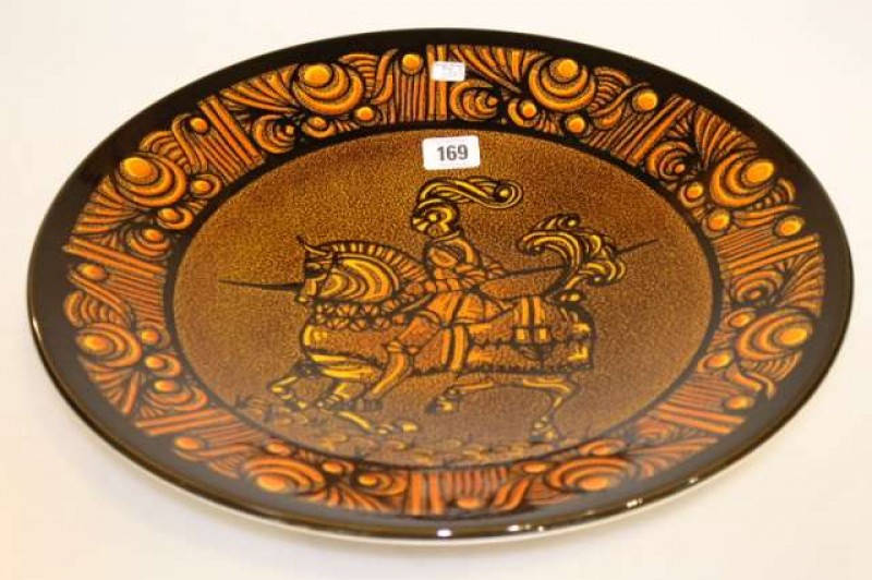 Large Poole charger decorated with jouster, signed Diana Davis
