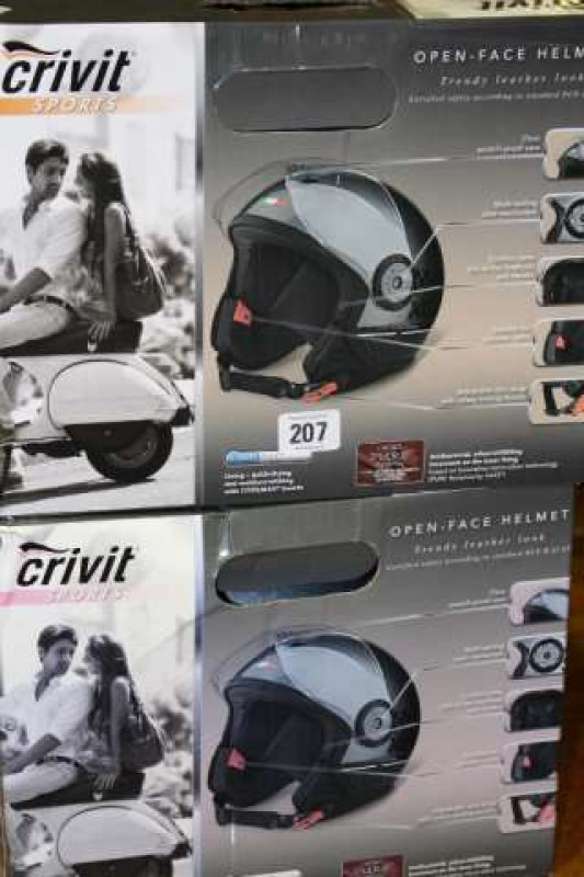 Two boxed Crivit open faced helmets