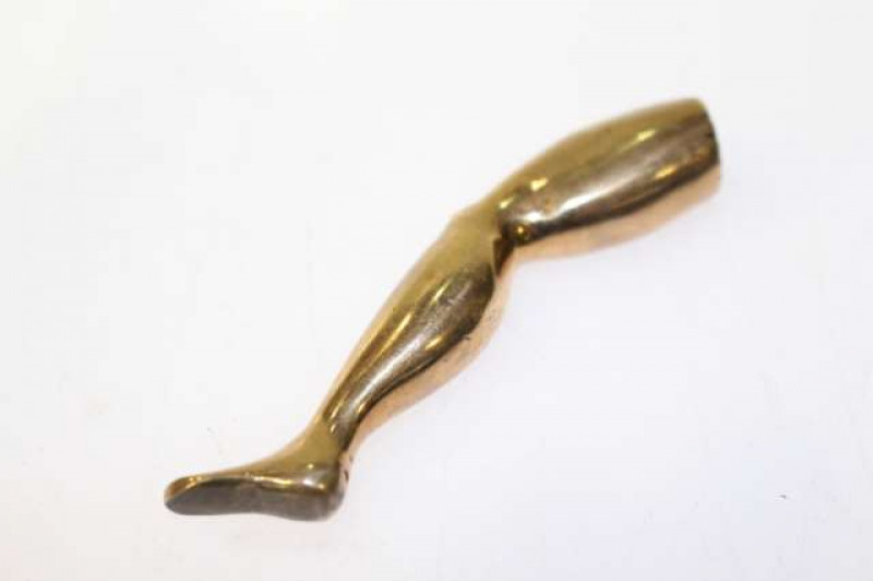 Victorian bronze pipe tamper in the form of a leg
