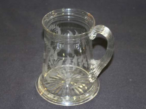 19th Century glass tankard with engraved garland and reeded rim and handle