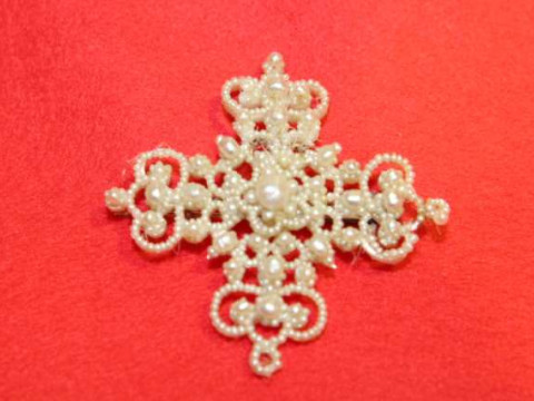 Intricate seed pearl brooch