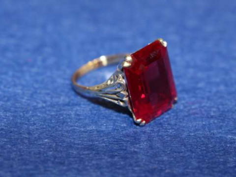 Ring set with a red stone