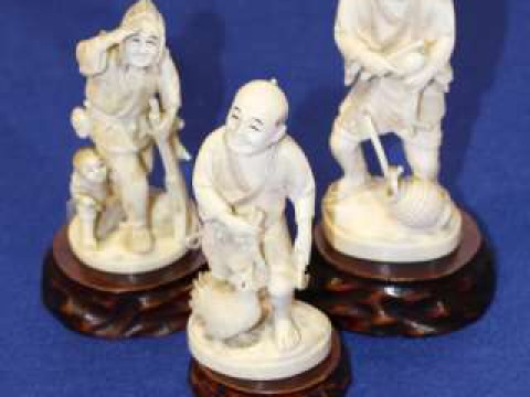 Three Japanese ivory okimonos, early 20th Century