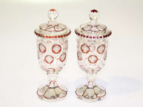 Pair of Bohemian ruby and etched glass vases and covers