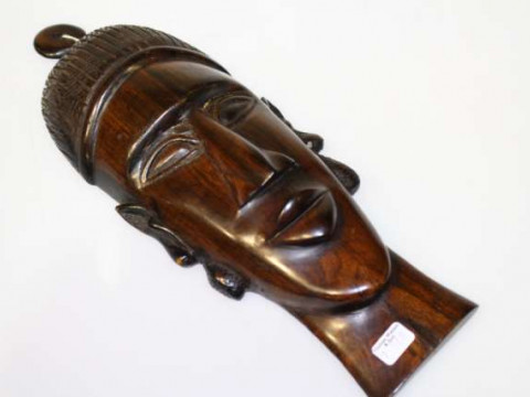 Carved hardwood wall plaque