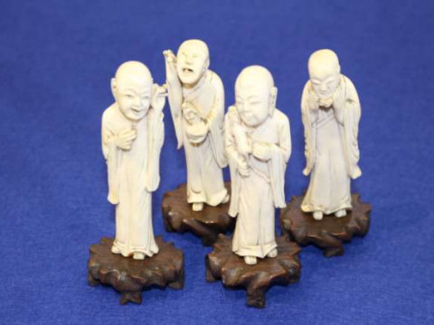 Set of four Oriental ivory figures, early 20th Century