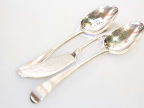 Newcastle silver butter knife and two Georgian silver tablespoons (3)