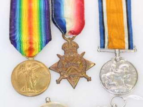 Medals and demob case (three medals: 71871 Donaldson) and two other medals