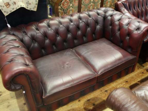 Ox blood deep buttoned leather two seater Chesterfield settee