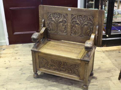 Carved oak monks bench