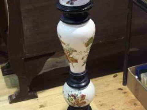 Ebonised and floral decorated pottery torchere