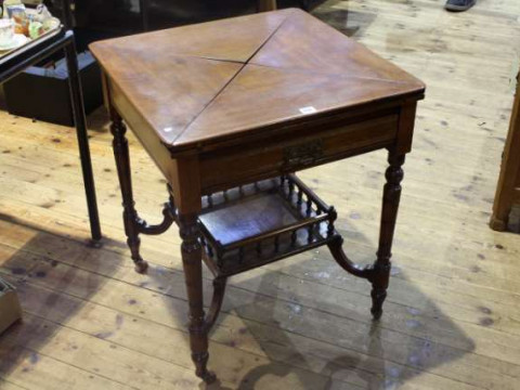 Late 19th Century walnut envelope games table