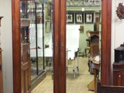 Continental mahogany arched top double mirror door armoire