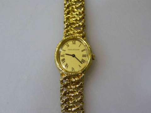Jaeger-Le Coultre lady's 18 carat gold wristwatch, gross 56 grams