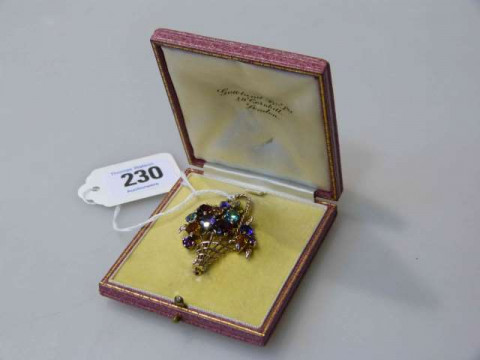 Early 20th Century multi-gem basket brooch in a fitted case
