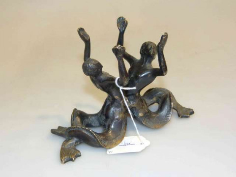 Bronze figure group of opposing merman