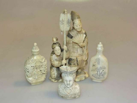 Japanese marine ivory Okimono, two Chinese ivory snuff bottles and a small...