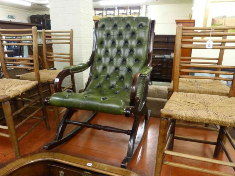 Green buttoned leather rocking chair