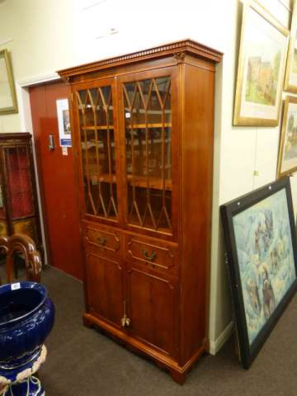 Yew four door cabinet bookcase