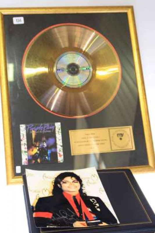 Purple Rain limited edition disc award, and Michael Jackson photograph