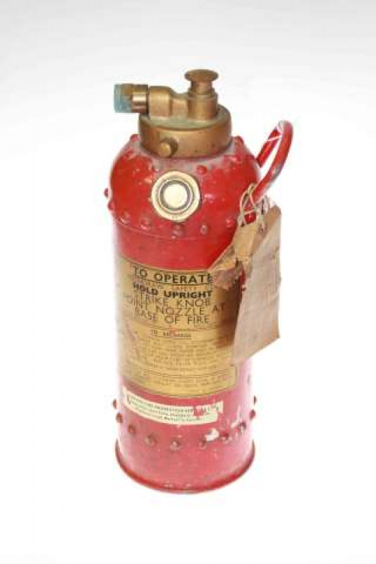 Small vintage fire extinguisher
