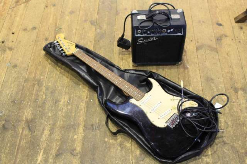 Electric guitar and Squier amplifier